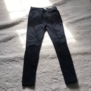 Ripped knee skinny jeans